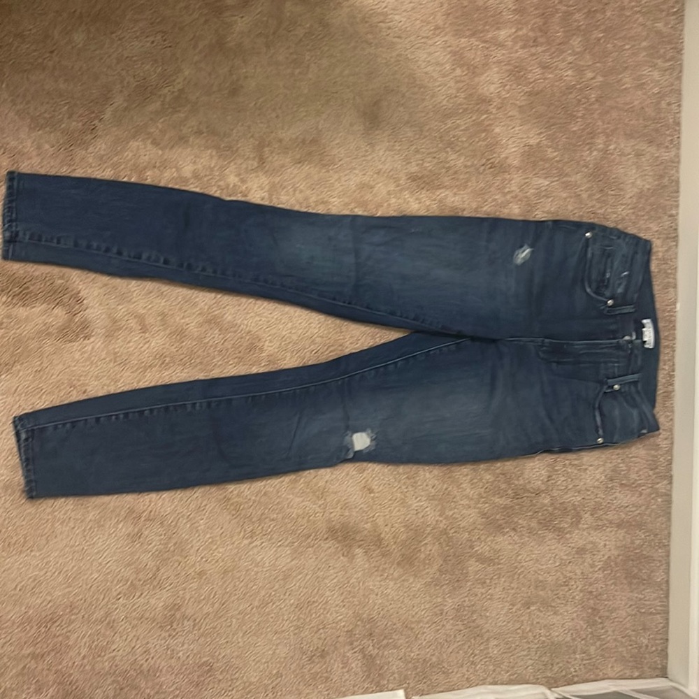 Good American, Good Waist Blue distressed jeans.